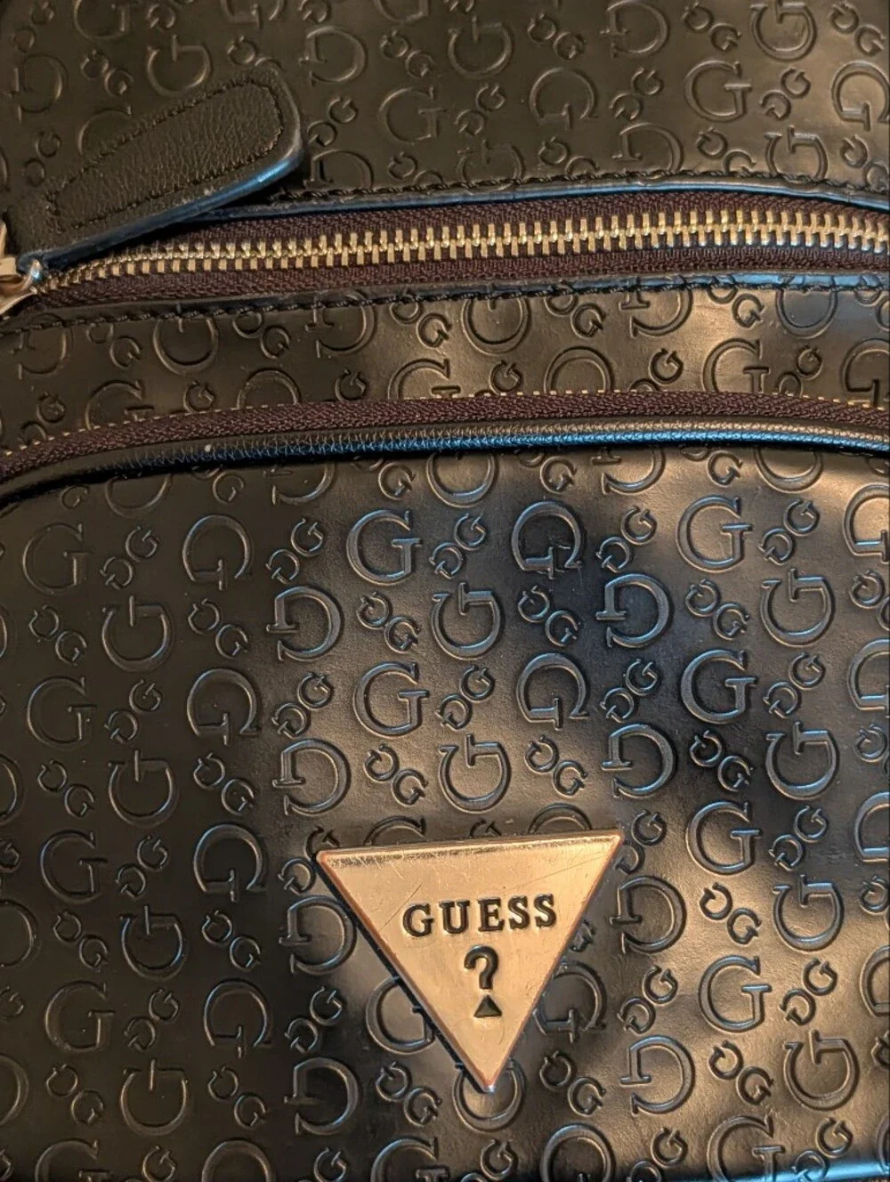 GUESS Black Embossed Logo Mini Backpack with Gold Accent